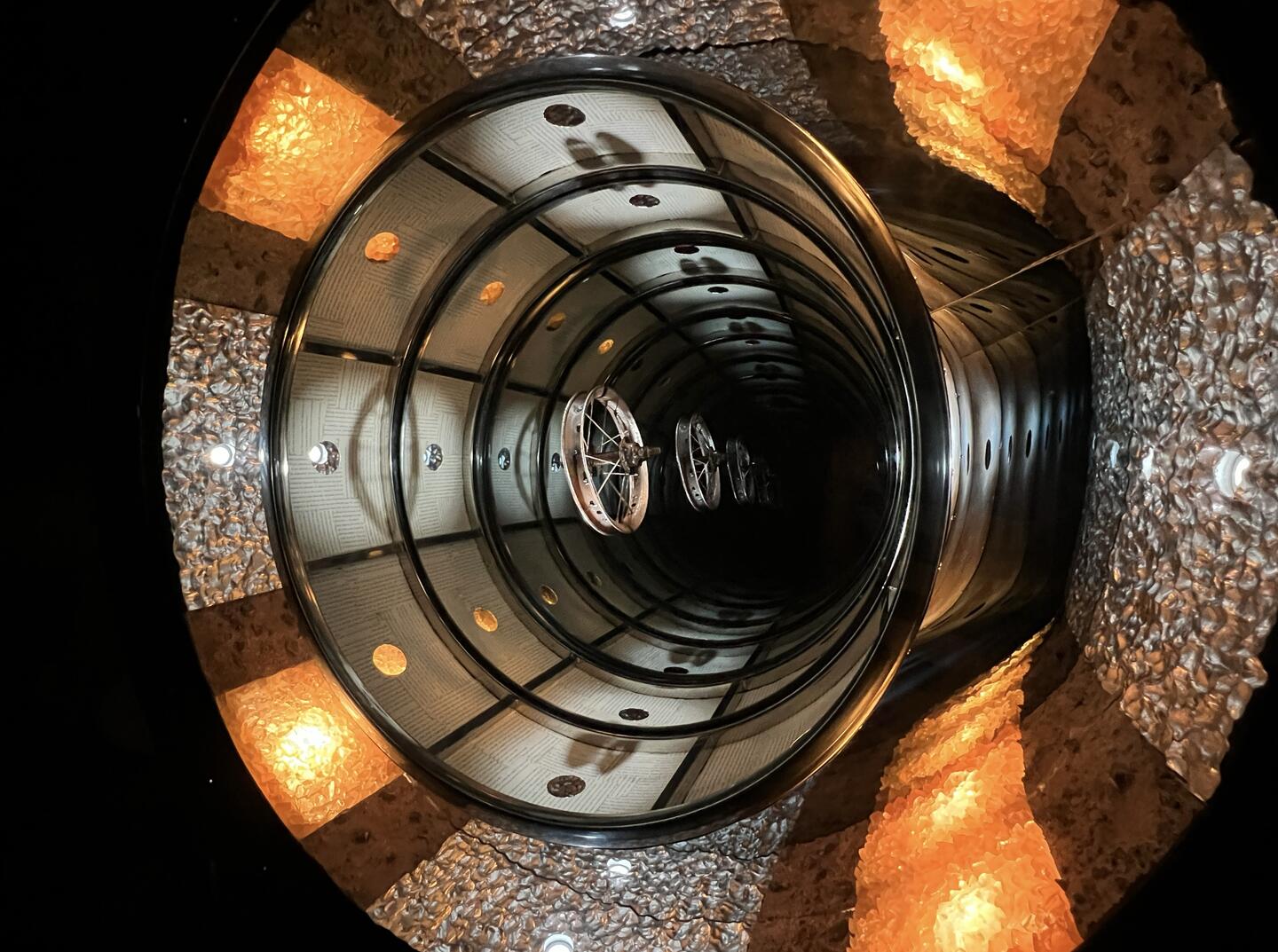 Mark Justiniani,&nbsp;Wormholes (close-up), 2024. Mixed media installation, LED bulbs, mirror, lightbox, 228.6 x 152.4 x 25.4 cm.&nbsp;Courtesy: the artist and The Drawing Room&nbsp;